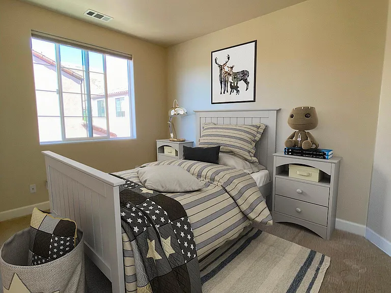 Versatile third bedroom_ideal as a nursery, guest room, or hobby space.