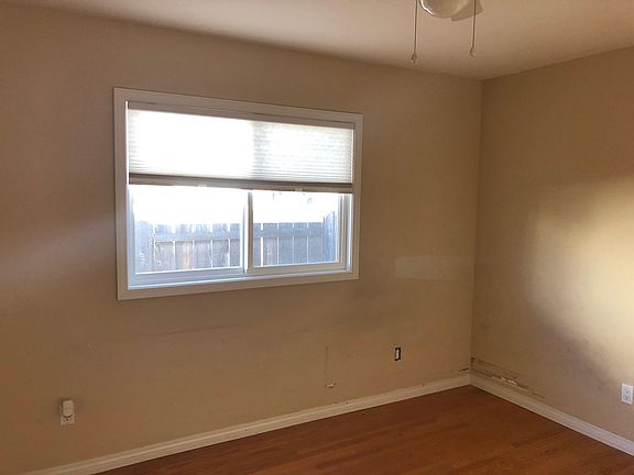 two smaller bedrooms, all with fans