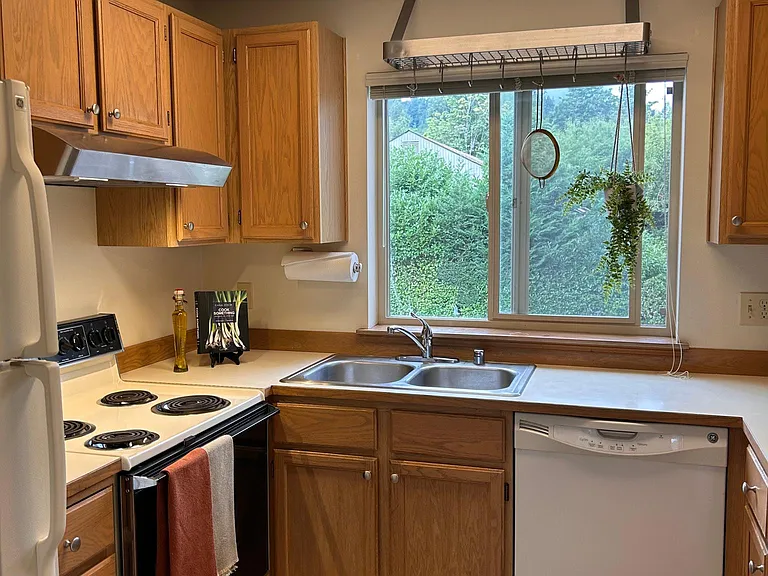 Kitchen with large window and lots of natural light.