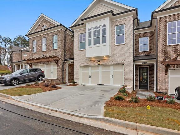 2-car garage in front entry in every unit, driveway for guest parking. Lovely exteriors with varying