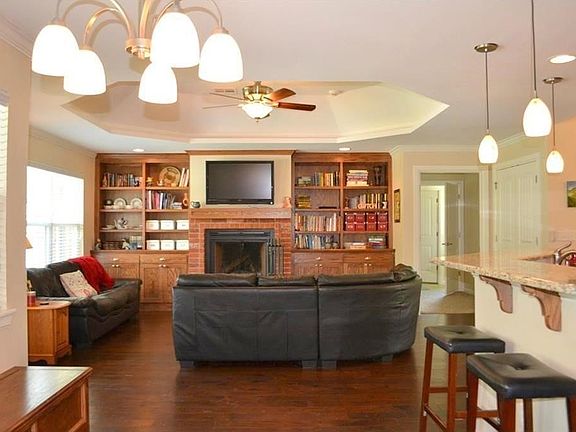 Open floor plan with built-in storage.  Fireplace can be either gas logs or optional wood burning.