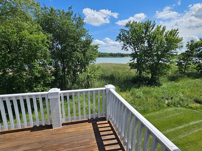 Deck off of Kitchen looking out towards the Lake and Nature areas.