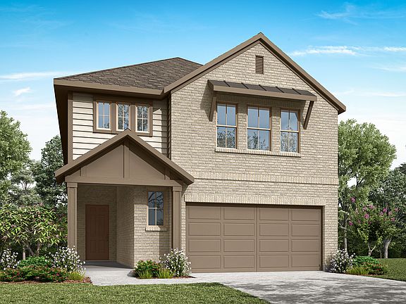 A two-story residential house with a garage, surrounded by lush greenery and a paved driveway in the