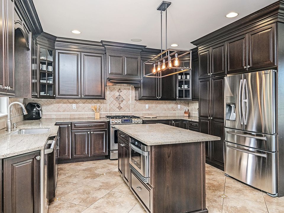 Beautifully renovated kitchen with large island and plenty of room to prep and cook