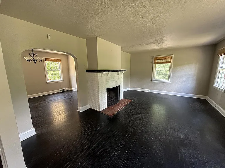 Historic architectural charm and detail in this 1932 cottage tucked at the edge of the woods, just a short walk from downtown Ellicott City.