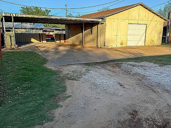 Carport and detached garage