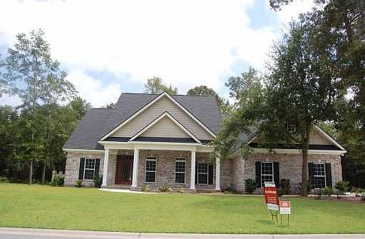 FULL BRICK - HALF ACRE LOT!