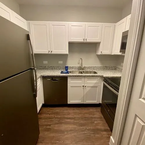 A Floor Plan Kitchen 
Great cabinet space with a pantry, stainless steel appliances included refrigerator with ice maker.
