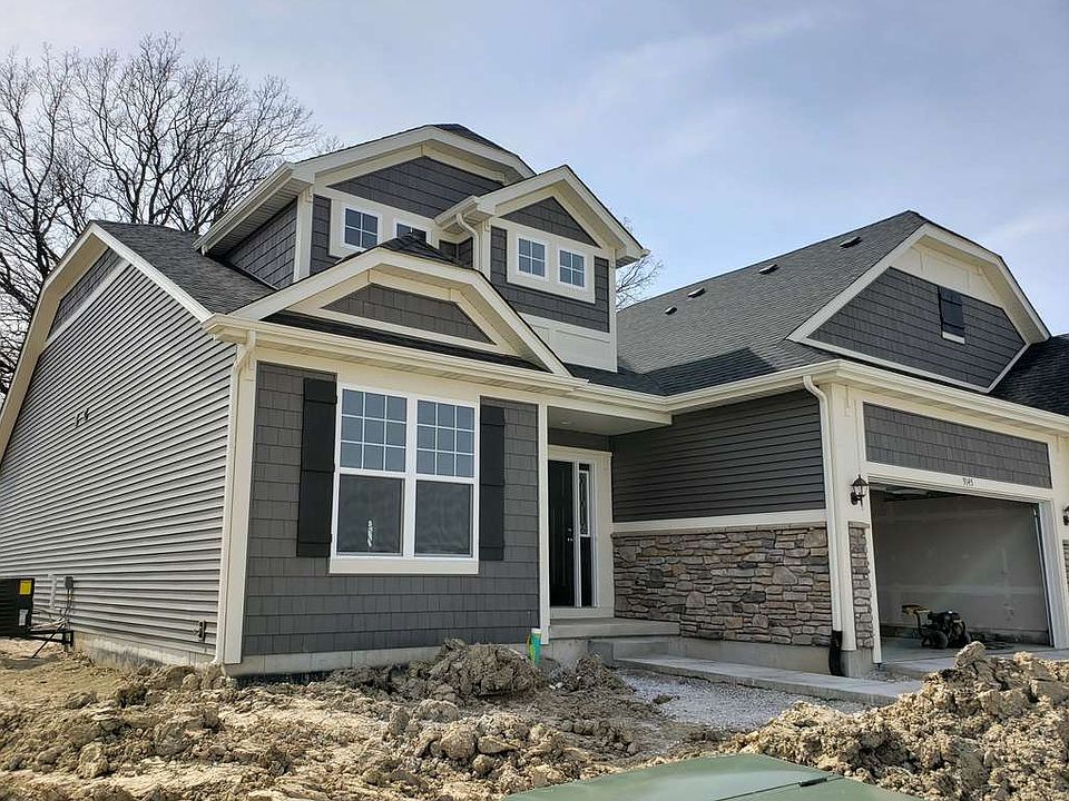 Maintenance free villa, on full basement, looks out to mature trees