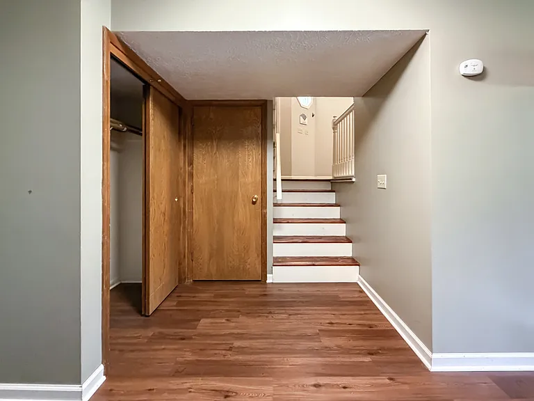Stairs from Main Level to Lower Level Family Room and Laundry Area