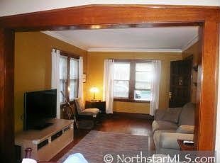 Wood arch between living and dining room