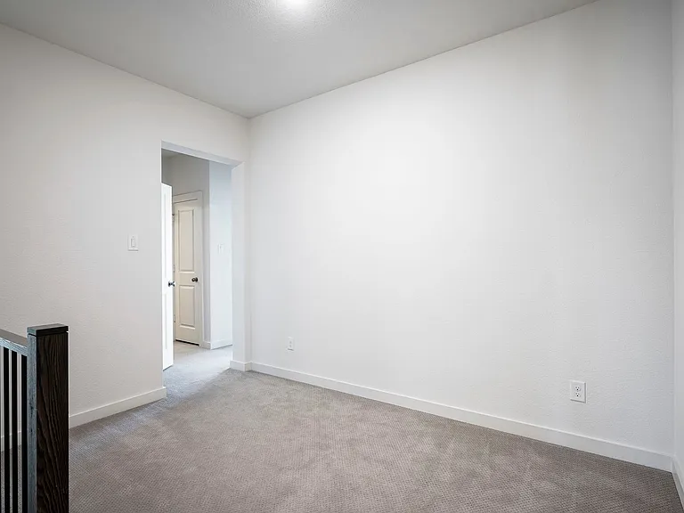 This upstairs loft makes for a perfect office or additional living area.