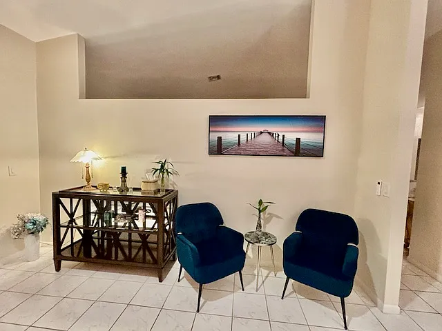 Coffee for two? This quaint Sitting area is part of the eat-in kitchen
