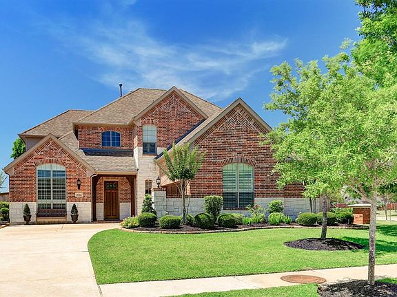 Double-wide driveway offers plenty of off street parking for guests.