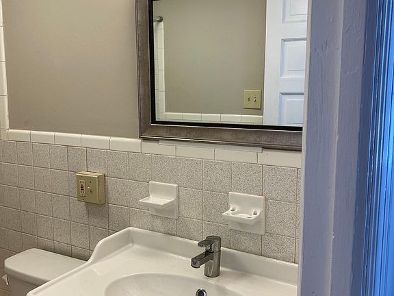 BRAND NEW BATHROOM VANITY AND LUXURY VINYL FLOORING