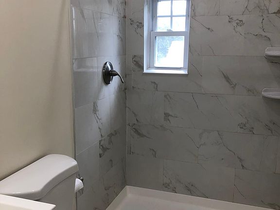 new tiled shower and floor