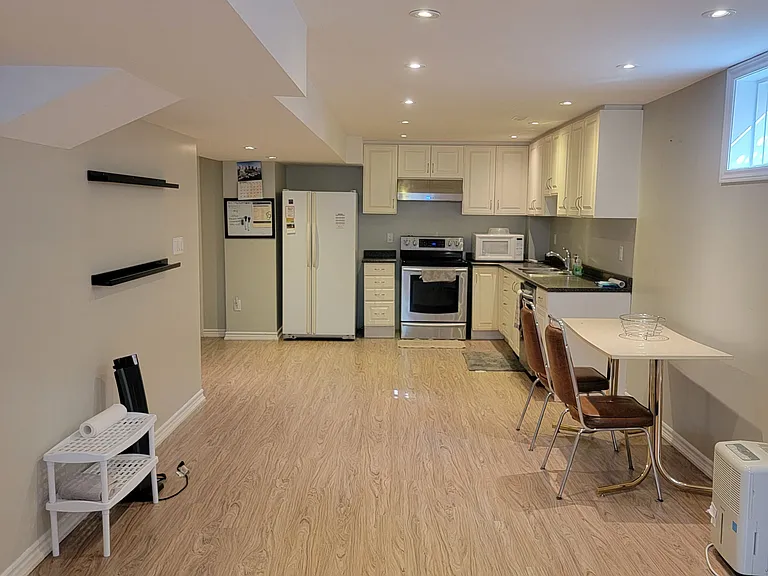 593 Ray Lawson Blvd #BASEMENT — Photo 2