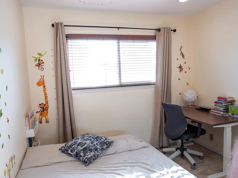 Bedroom 3 with carpets before which have now been replaced with wooden flooring