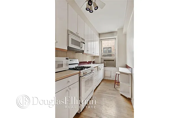 Sold by Douglas Elliman | media 18