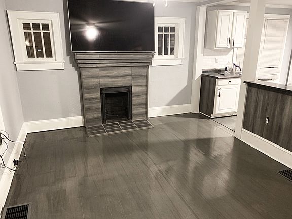 Living Room Opens Into Kitchen