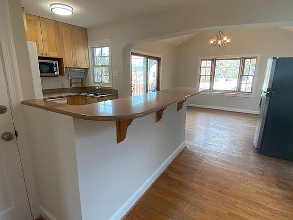 Kitchen opens to family room area! Spacious breakfast bar for 4 people!