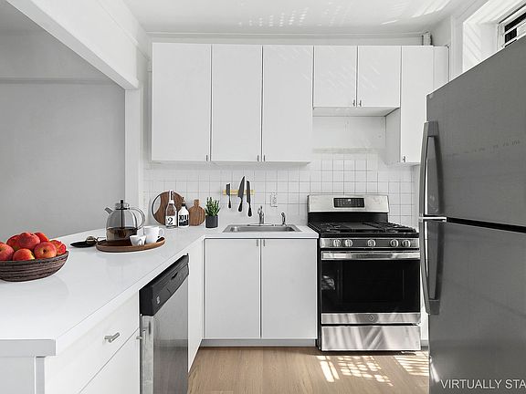 3rd image of 23 E 7th St APT 1