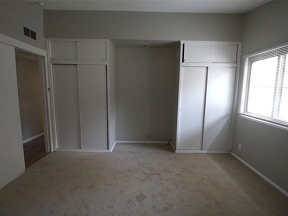 Master bedroom has two closets and nook for dresser/shelves. New carpet, fresh paint, new blinds.