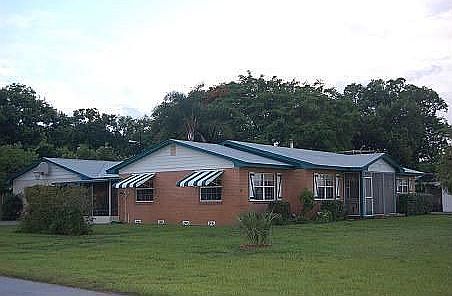 Facing lake with front porch