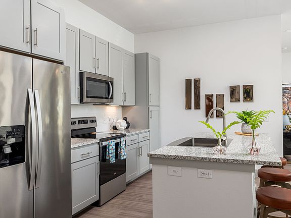 High-End Kitchen with Granite Counters and Stainless Steel Appliances