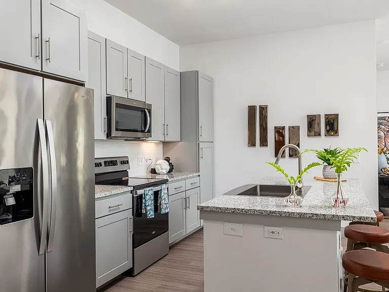 High-End Kitchen with Granite Counters and Stainless Steel Appliances