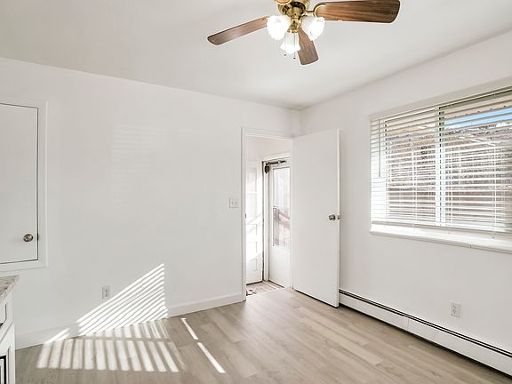 Kitchen door way to basement and back door