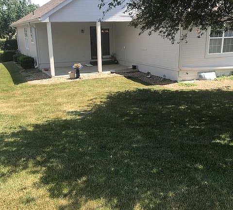 Enjoy entertaining on this covered patio .