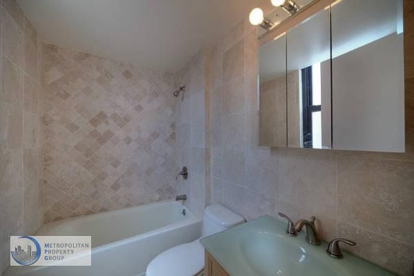 1st image of 100 W 23rd St Fl 2