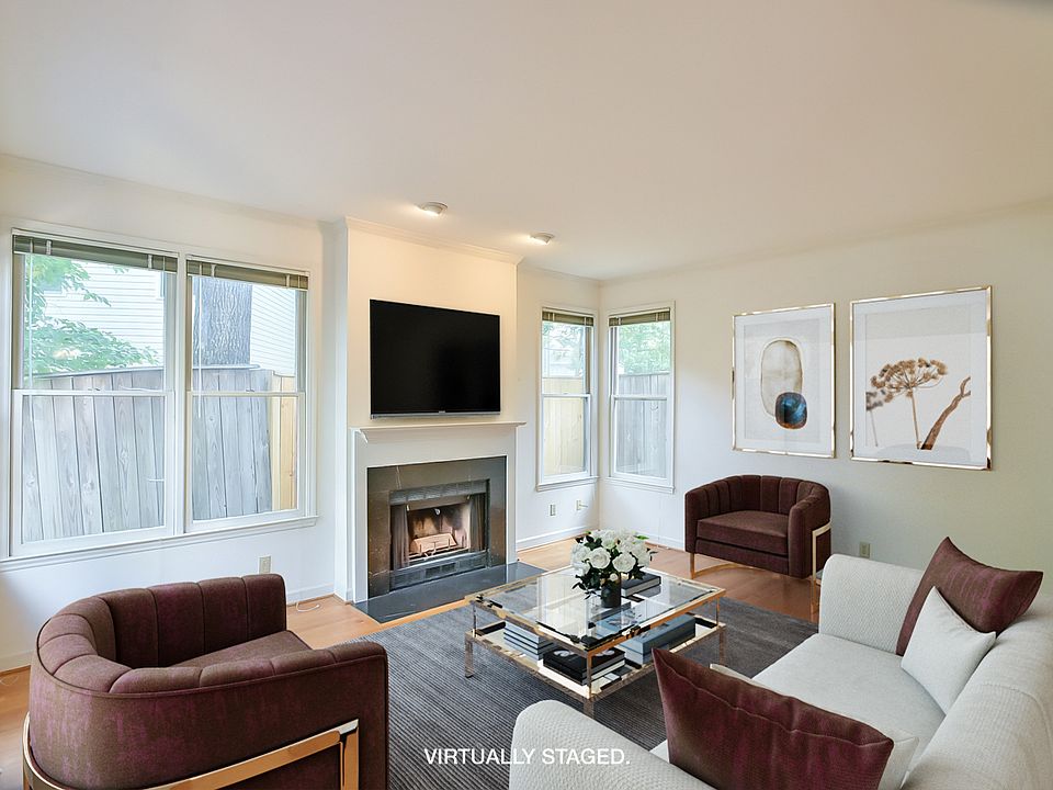 Amazing Family Room!! Great natural light, wood floors and a fireplace.