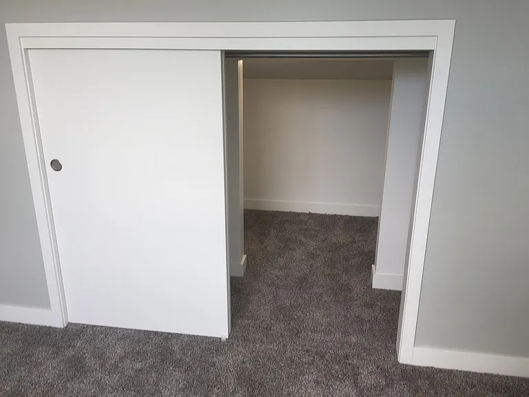 third floor bedroom closet w/ additional storage