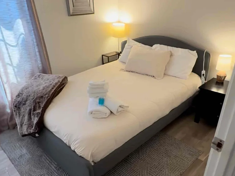 Queen bedroom 2 - new ac, fan, drapes, flooring and drapes. Optional desk - standup or sitdown & chair (not shown)