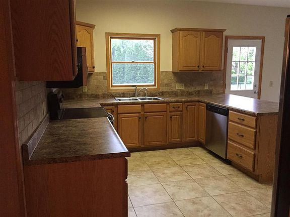 Lots of cabinets, & island.