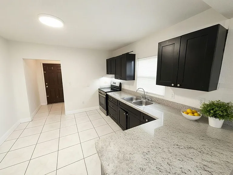 8013 NW 10th Ct — Photo 3