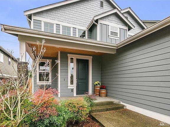 This 2-story home with welcoming front patio offers all the comforts of modern living.