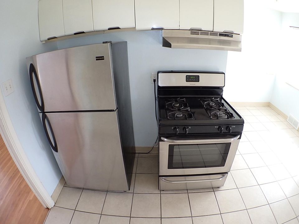 Stainless steel refrigerator and Gas stove.