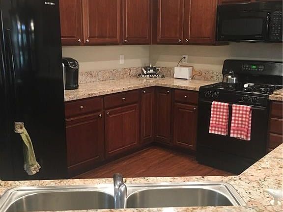 This kitchen is the heart of the home.  Warm and friendly.