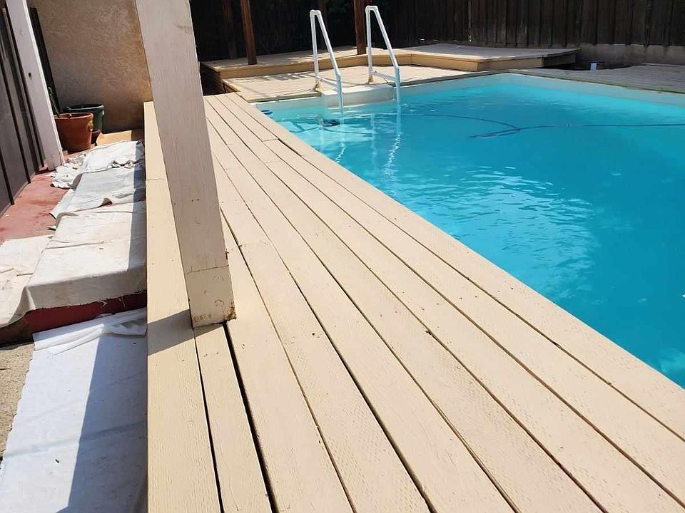 Backyard - New Deck Surrounding Pool