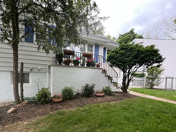 Front of home in summer.