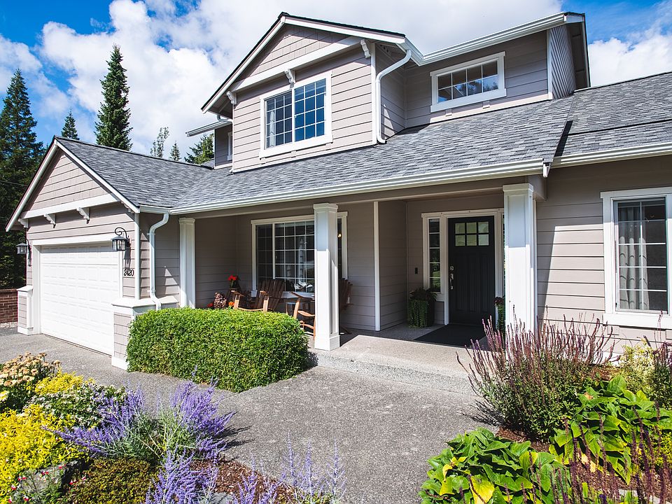 Exterior front, 2 car garage with additional off-street parking for RV/Boat.