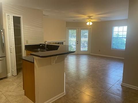 Open concept with large bar. Room for 4-6 barstools!