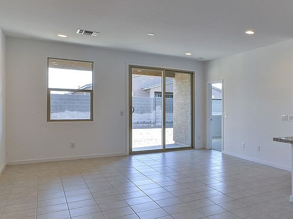 The living room is the perfect place to unwind for a movie night at the end of a long day.