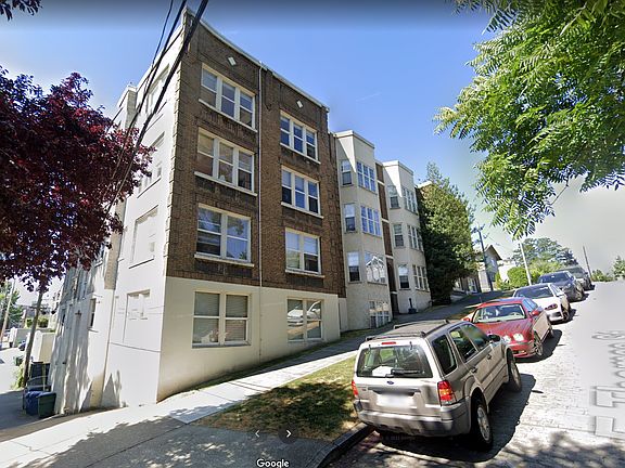 North side of building, paved alley behind building