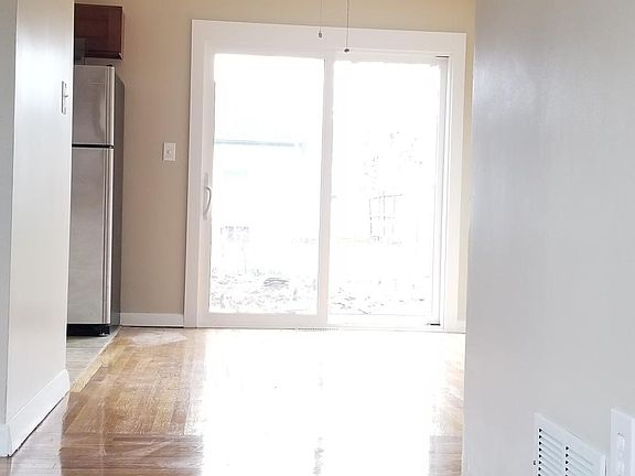 Beautiful restored hard wood flooring throughout, new slider off dining area.