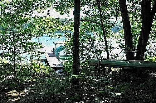 view of dock and lake