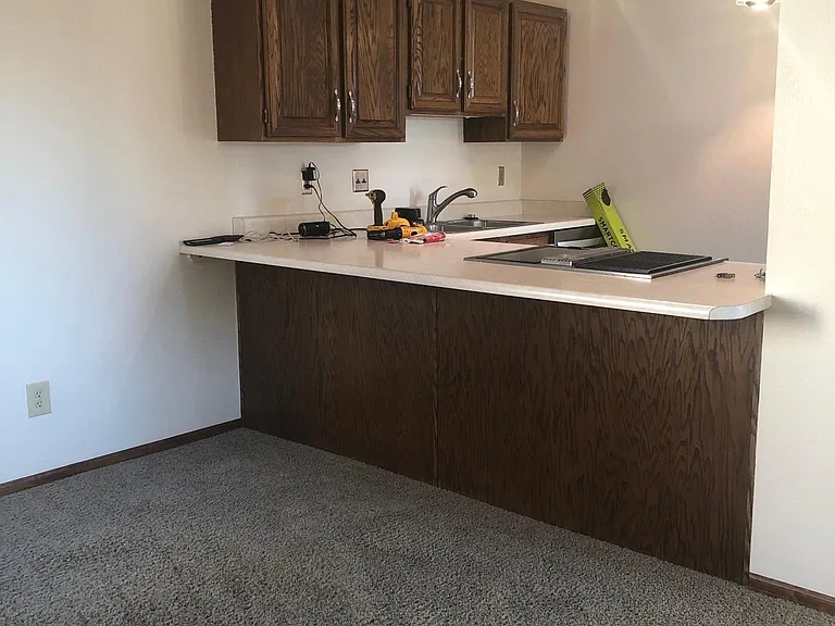 Dining area looking into kitchen (being updated, hence the tools)
